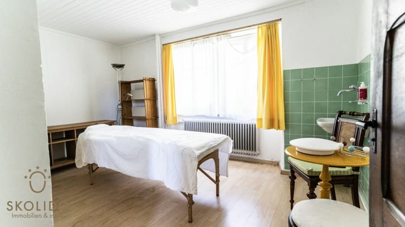 Village shop, large restaurant with terrace, duplex apartment, garages, and building land in the heart of Mund (34)