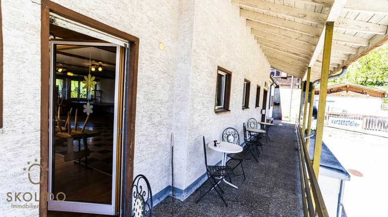 Village shop, large restaurant with terrace, duplex apartment, garages, and building land in the heart of Mund (15)