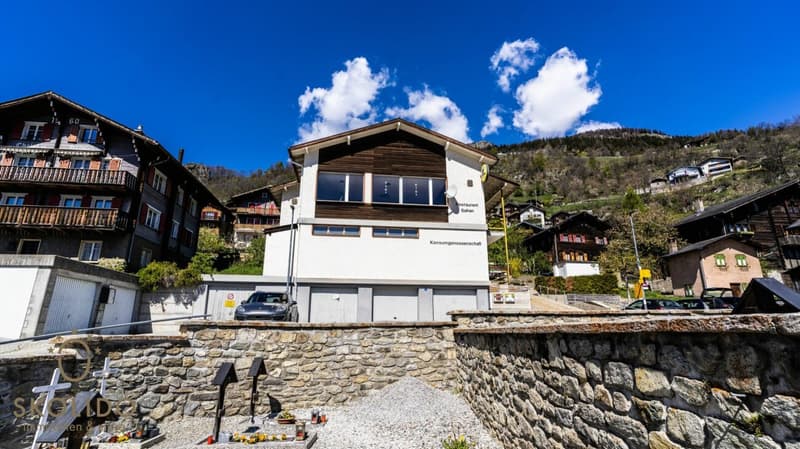 Village shop, large restaurant with terrace, duplex apartment, garages, and building land in the heart of Mund (45)