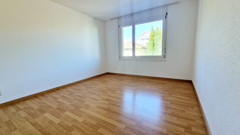 empty room, wooden floor, white walls, large window