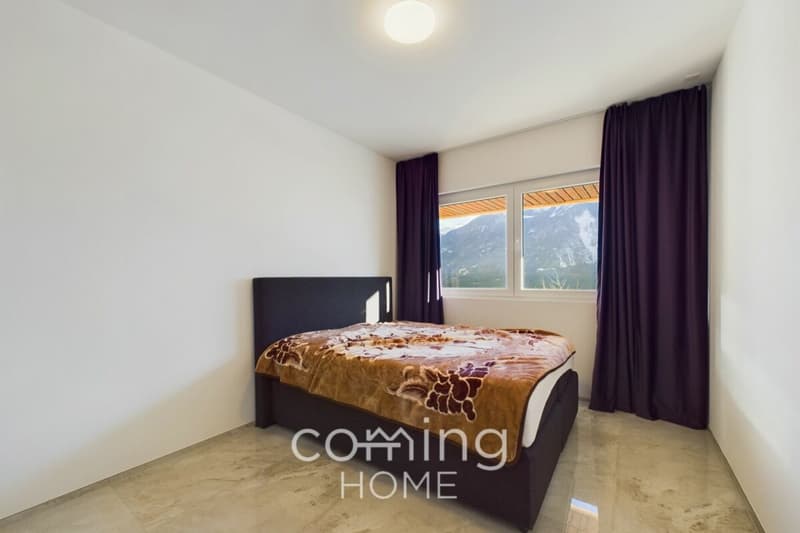 Investment opportunity in the wine-growing village of Varen - a three-flat apartment block with mountain views (10)