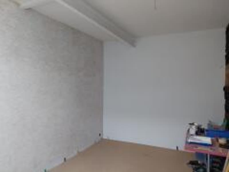unfurnished room, white walls, beige floor, power outlet, wall paper