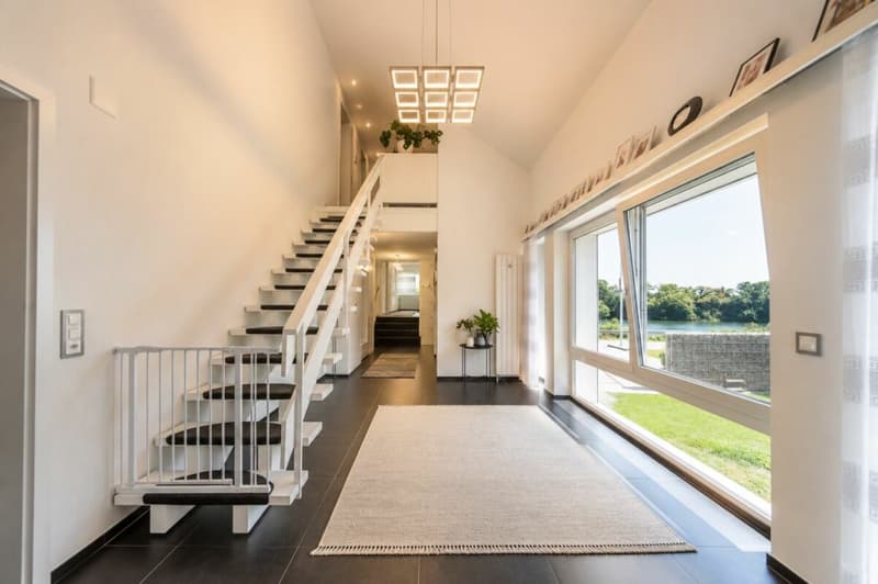 Luxuriöses Wohnen direkt am Rhein - exklusives 6.5-Zimmer-Einfamilienhaus mit traumhafter Aussicht (7)