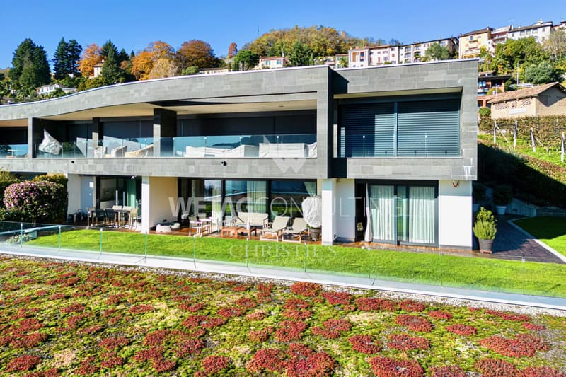 Prestige-Duplex-Wohnung in Porza mit privatem Garten & weitem Blick auf den Luganersee zu verkaufen (1)