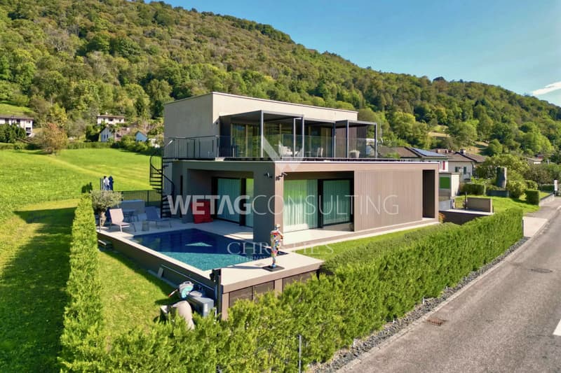 Moderne Design-Villa mit Pool zu verkaufen in Lugano-Sessa, eingebettet im Grünen (1)