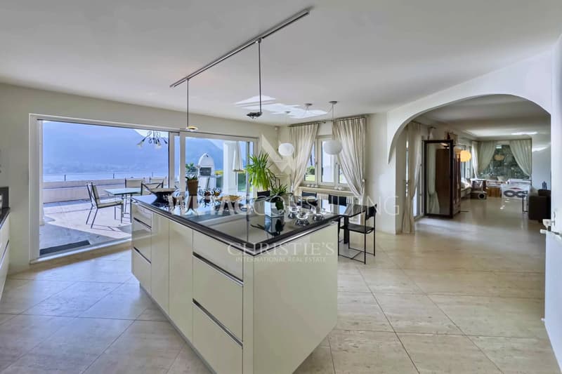 Lugano-Figino : Villa élégante avec vue imprenable sur le lac de Lugano & piscine intérieure à vendre (3)