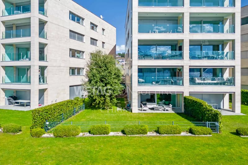 Lugano-Muzzano, in vendita: appartamento moderno direttamente sul lago di Lugano con grande giardino privato (12)