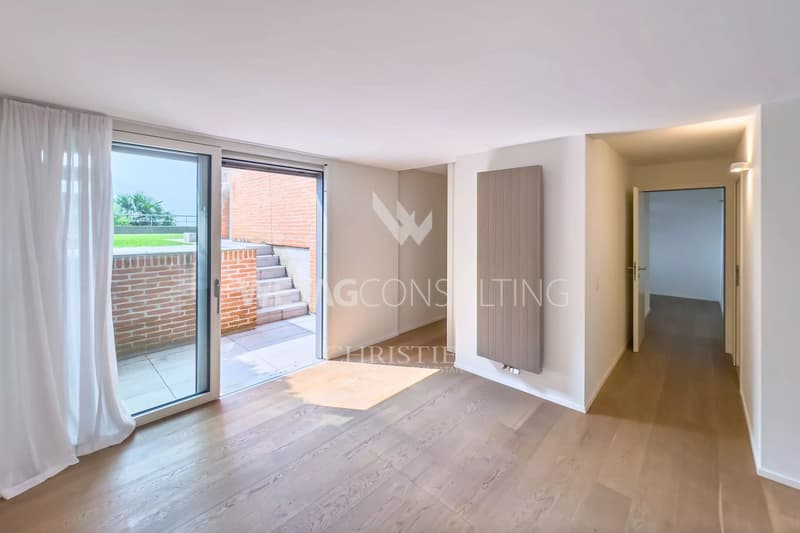 Lugano-Porza : maison en rangée avec jardin privé & vue sur le lac à vendre, également possible comme résidence secondaire (9)