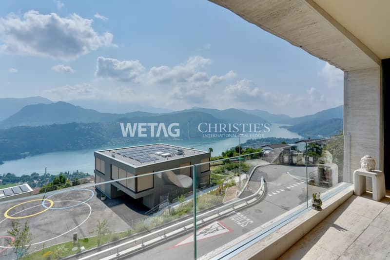 Zum Verkauf in Lugano-Vernate: Moderne Attikawohnung mit spektakulärer Aussicht auf den Luganersee & privatem Garten (2)