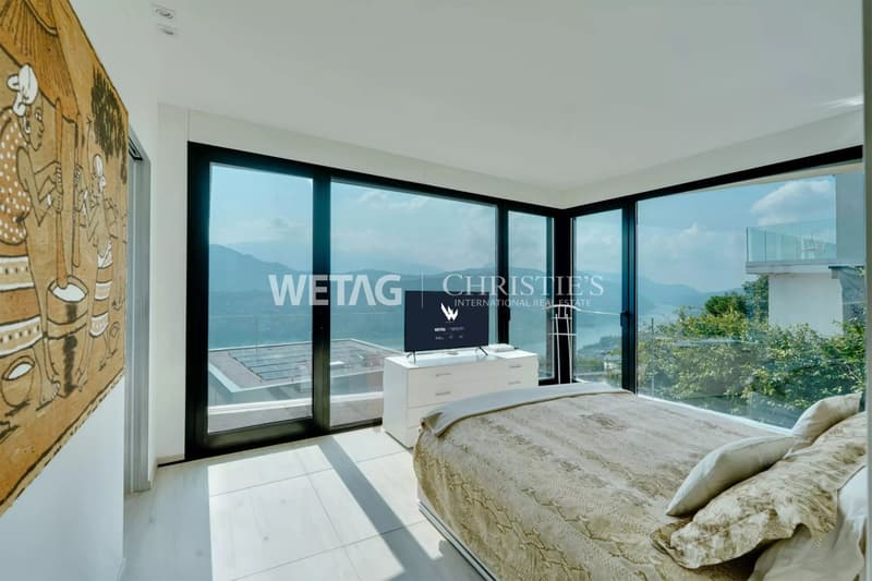 Zum Verkauf in Lugano-Vernate: Moderne Attikawohnung mit spektakulärer Aussicht auf den Luganersee & privatem Garten (5)