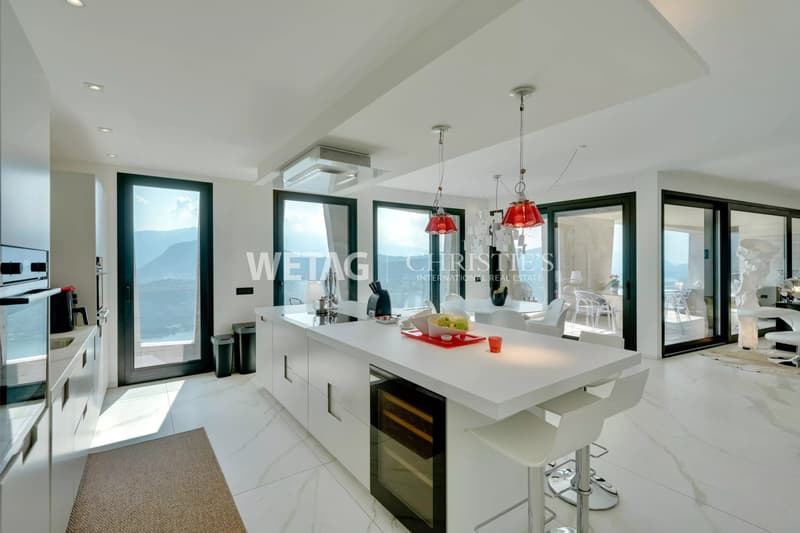 Zum Verkauf in Lugano-Vernate: Moderne Attikawohnung mit spektakulärer Aussicht auf den Luganersee & privatem Garten (8)