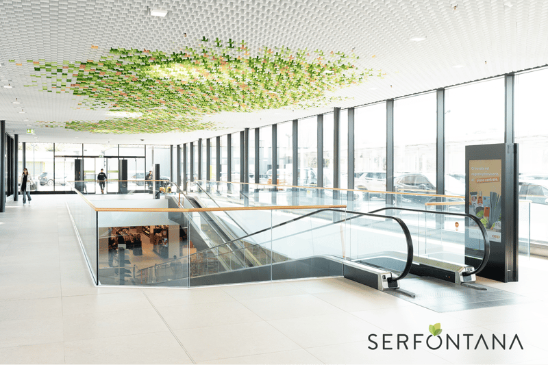 modern building, glass walls, escalator, tiled floor, decorative ceiling