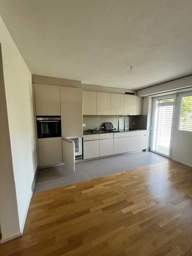 Sonnige Wohnung mit Gartensitzplatz (2)