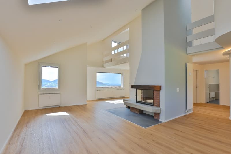 wooden floor, fireplace, white walls, windows with views, modern and spacious