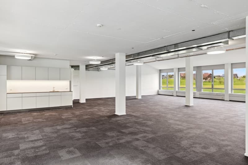 empty room, kitchen area, large windows, recessed lighting