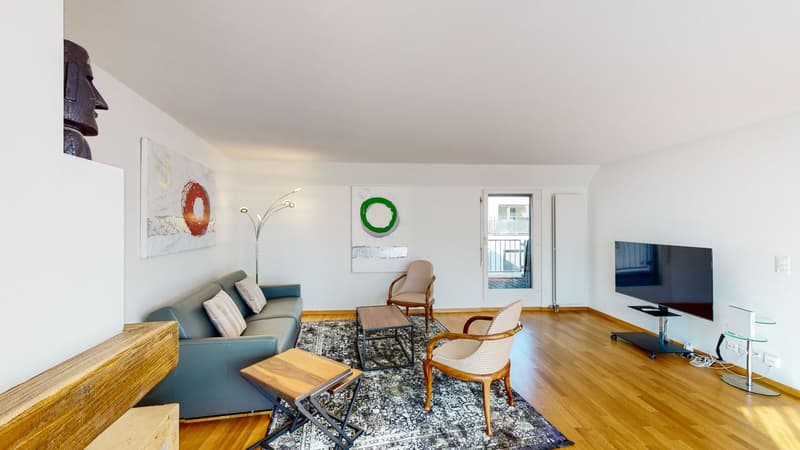 a room with a couch, chairs, table, TV, floor lamp, painting, wooden desk, carpet
