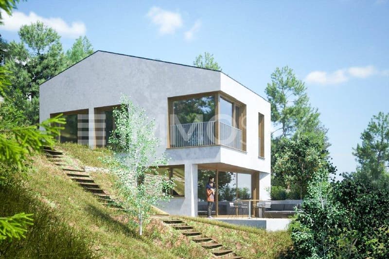 Maison moderne avec grandes baies vitrées pour profiter de la vue