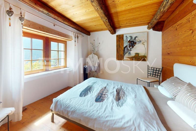 Camera da letto con vista sulle montagne