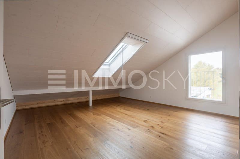 Helles Dachzimmer