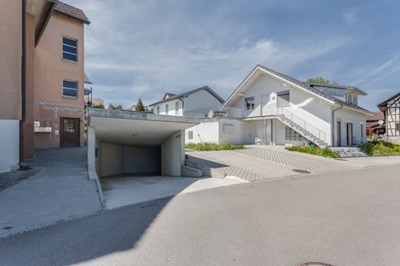 2 story house, white exterior, garage, driveway, stairs