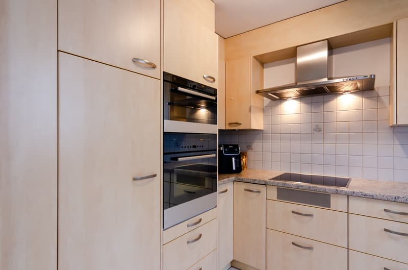modern kitchen, gas stove, electric oven, kitchen cabinets, tile walls, marble countertops