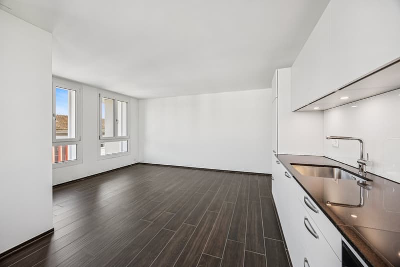 empty room, tile floor, white kitchen with white cabinets, sink, faucet, double windows