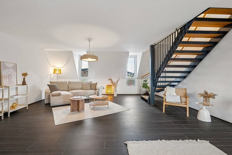 living room with couch, coffee table, lamp, stairs