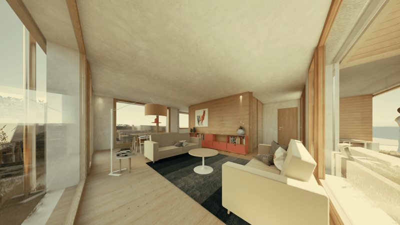 Open-concept living room with large windows, wooden floors, white walls, modern furniture including a sofa, coffee table, and shelving unit, and a balcony or terrace visible through the windows.