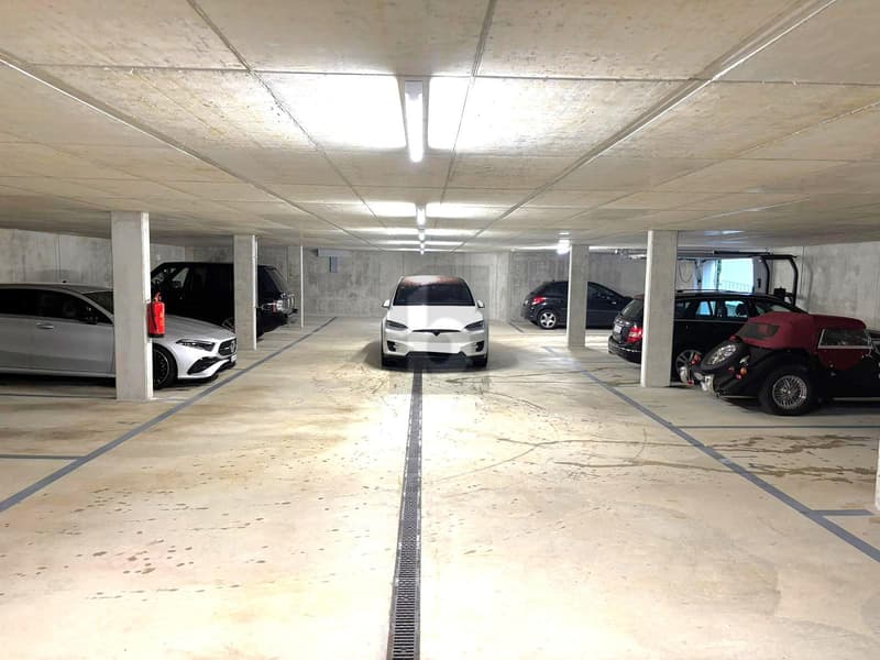 PARKING NEUF EN SOUS-SOL AU CUR DU VILLAGE ! (4)