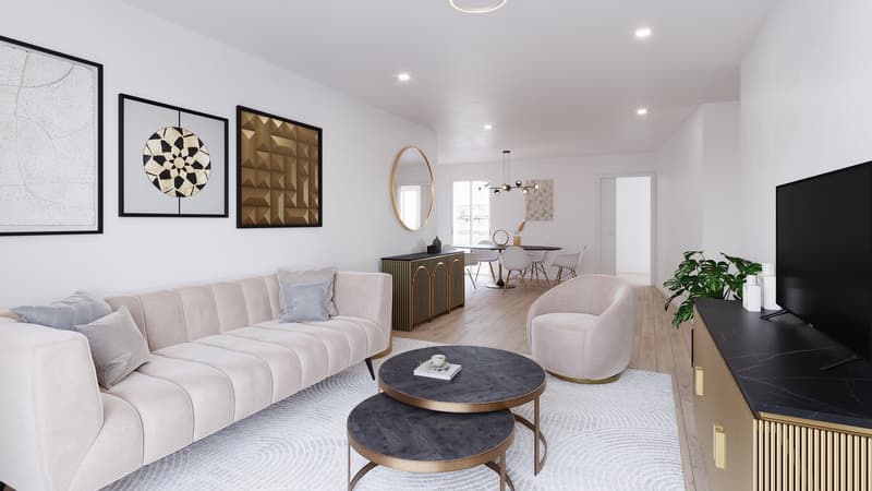 living room with couch, tables, tv, mirror and art