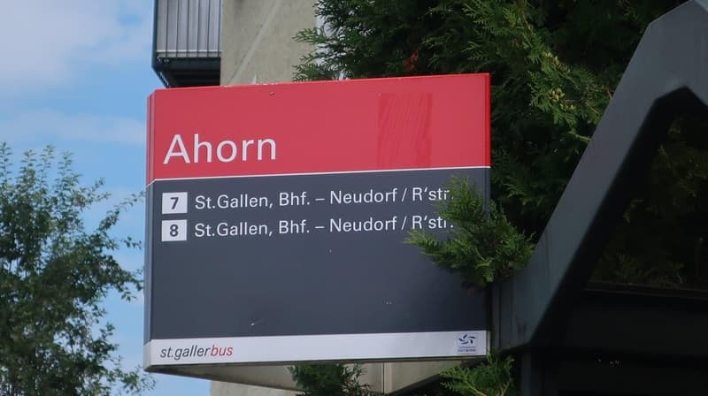 Ahorn sign with two bus stop numbers and locations