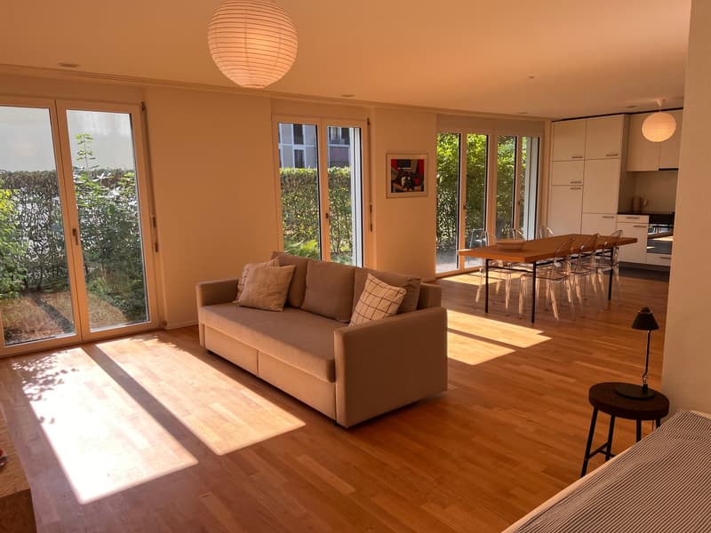 Moderne und helle Wohnung mit Gartensitzplatz (1)