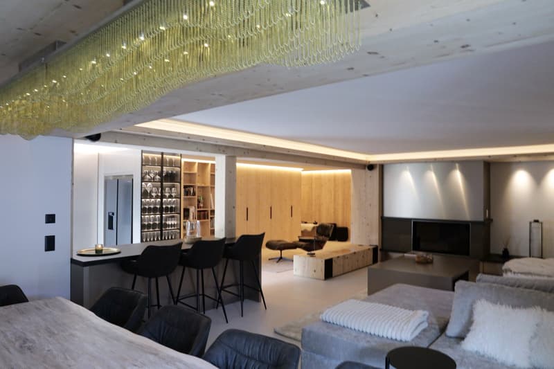 modern furniture, wooden cabinets, island kitchen, bar stools, fireplace, living room sofa, dining table