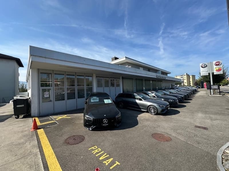 Ansicht Bestandesbaute (Autogarage-Werkstatt) / Baulandgrundstück
