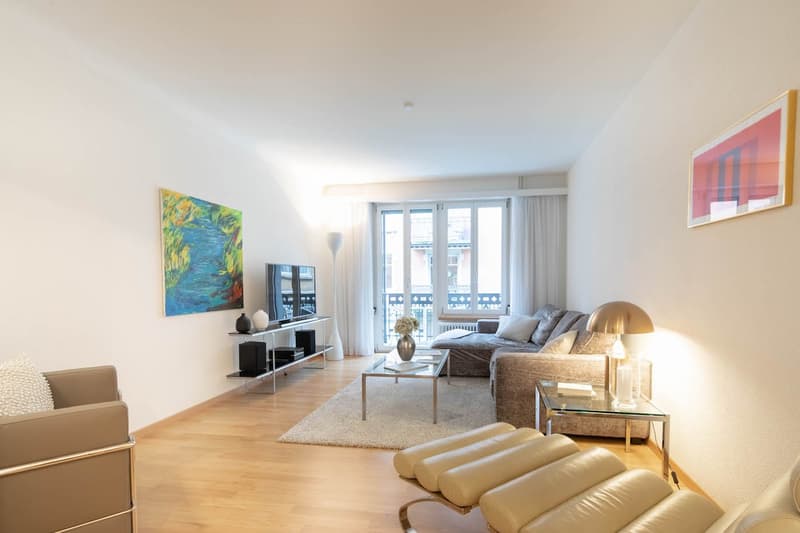 balcony, carpet, table, couch, lamp, tv