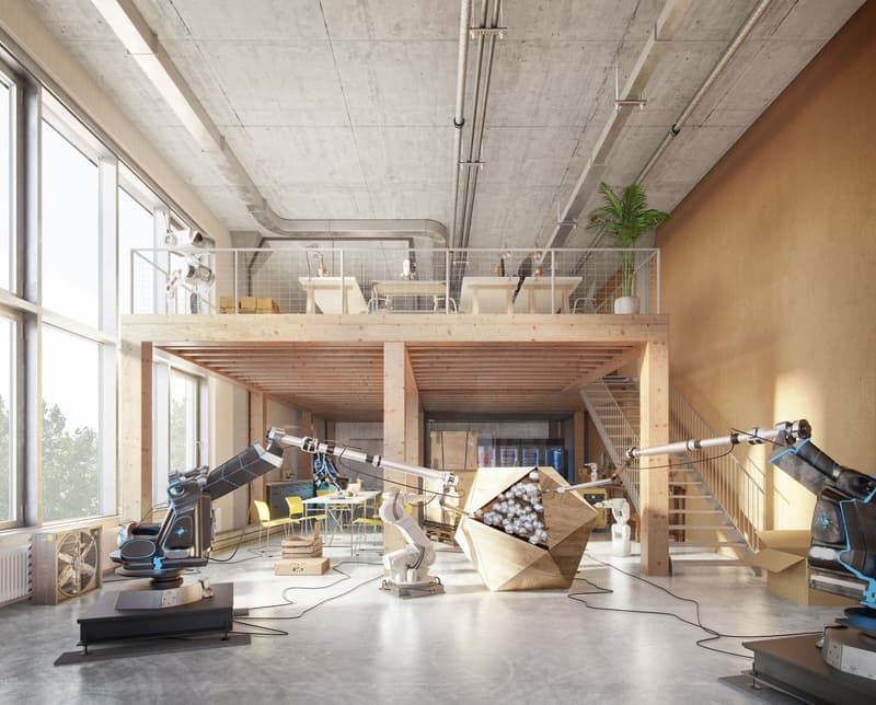 Large open-concept space with concrete ceiling and walls, wooden beams and platforms, various equipment and tools, and a raised mezzanine area