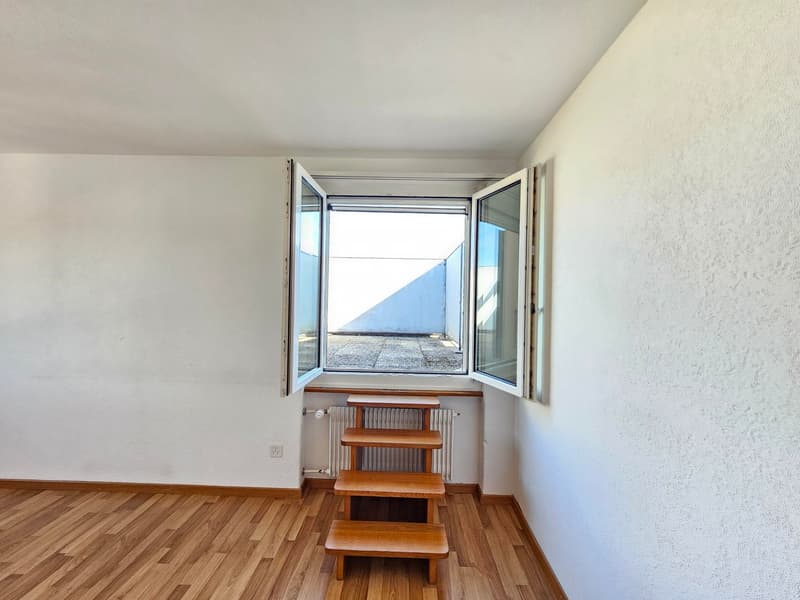 empty room, wooden floor, white walls, open window, wooden stairs