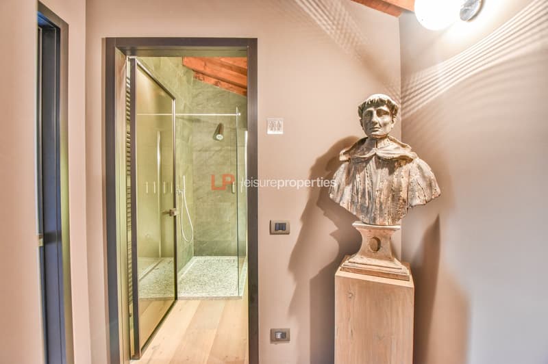 statue, glass shower, light