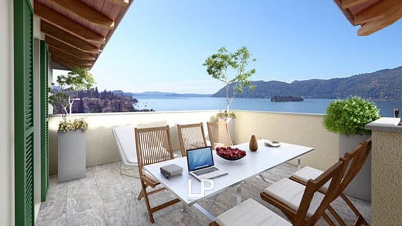 Large terrace, table and chairs, open sea view