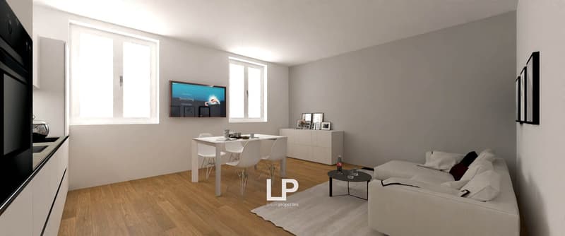 Modern minimalist living room with white couch, gray walls, large windows, and white table and chairs.
