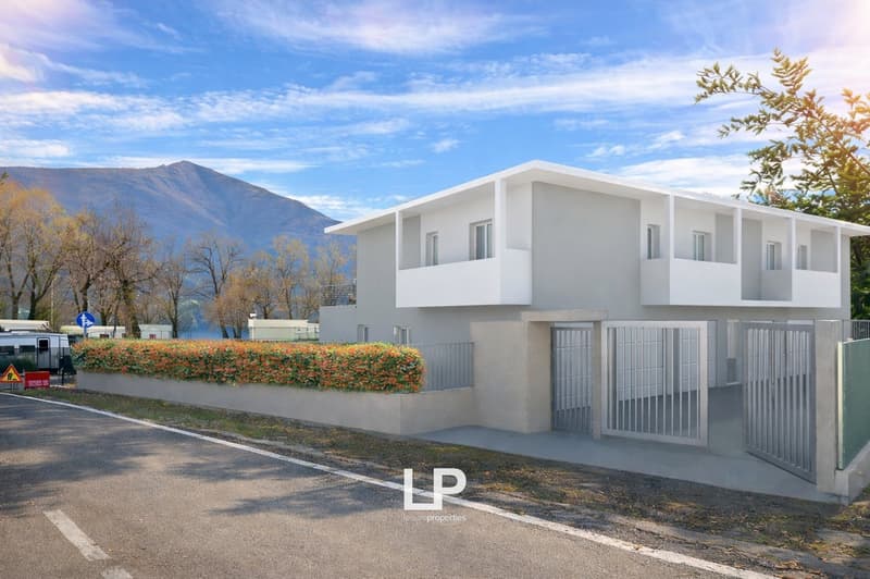 White house with 2 floors, balconies, modern design, metal gates