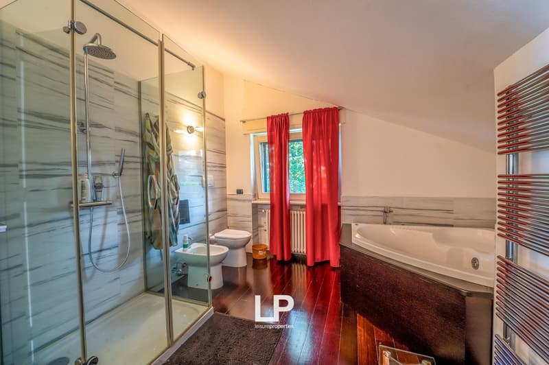 shower, bathtub, toilet, bidet, radiator, window, curtains