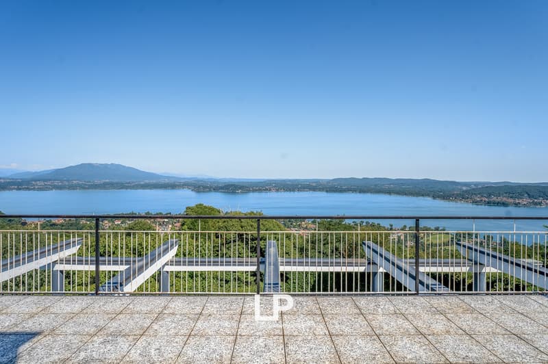 Large terrace with stunning lake and mountain views