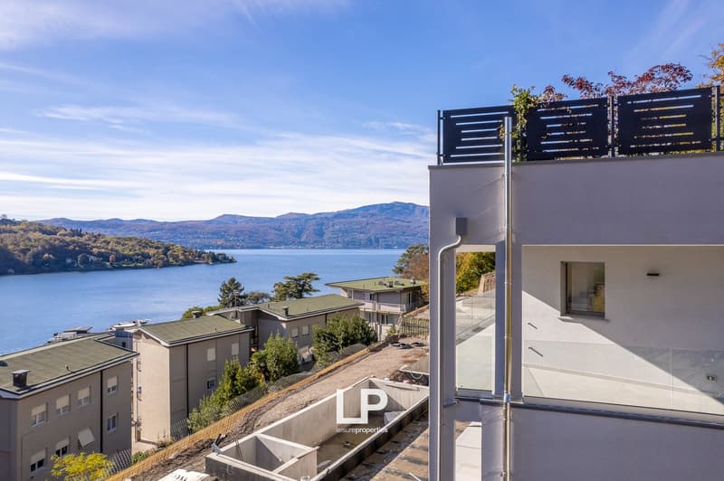 detached house, 3 floors, modern architecture, terrace with lake view, balconies, garden, panoramic view