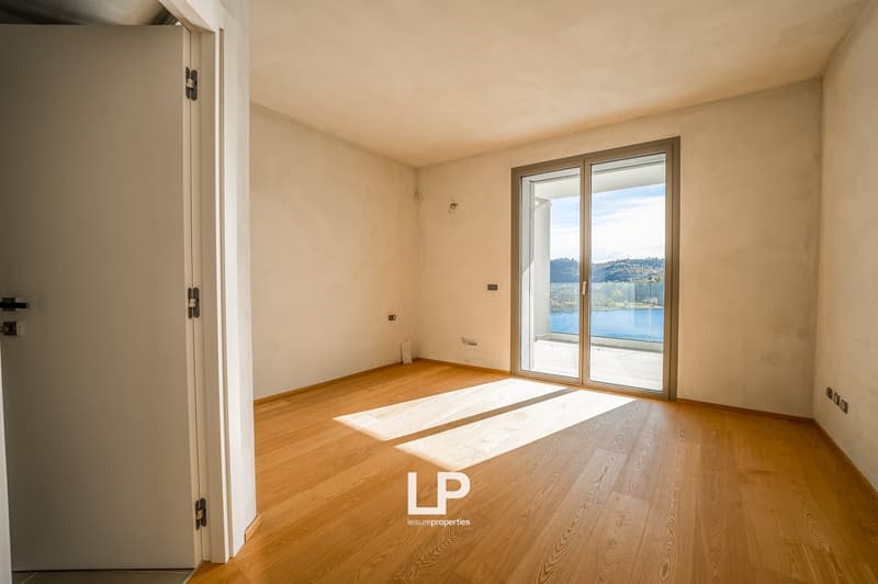 wooden floor, double door, sliding door with glass panels, lake view