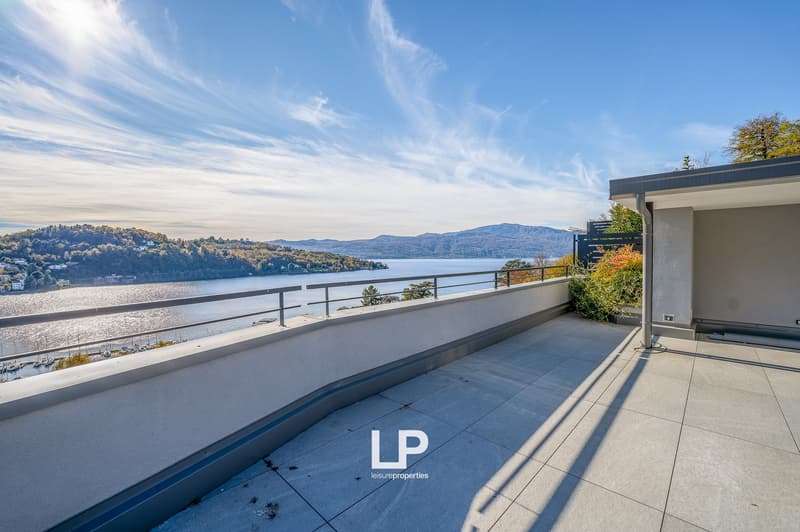 tiled floor balcony, railing, lake view, sun exposure, plants