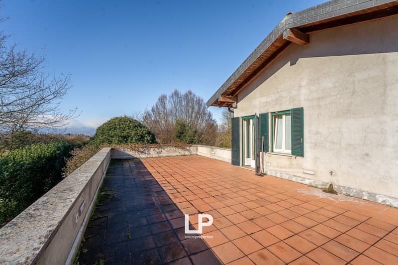 tiled terrace, green shutters, view of hills