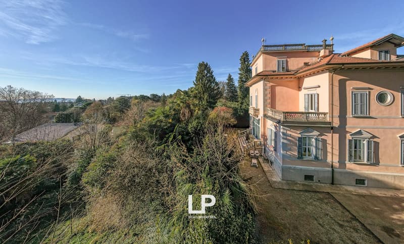Villa built on hill top with views over Florence, arched windows, balconies, red roof