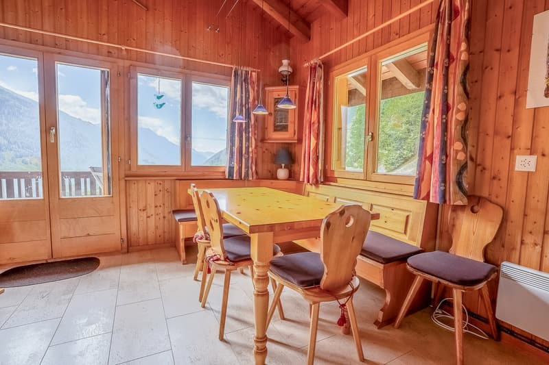 Wooden floor, wooden bench, table and chairs, window, view