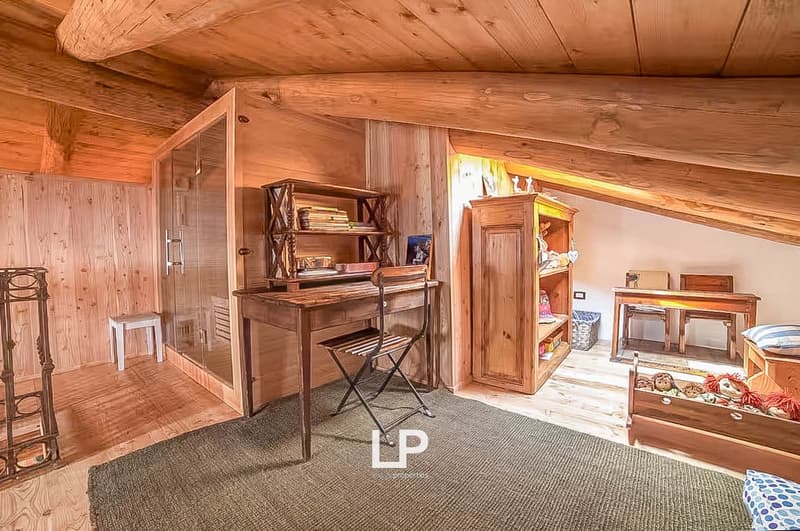 wooden walls, desk, folding chair, wooden bed, shelves, carpet